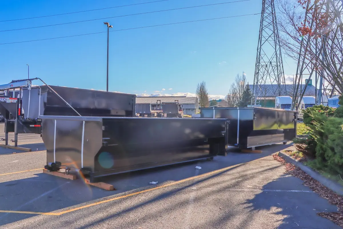Roll-off dumpster ready for waste disposal at job site for 3 Yard Dumpster Rental in Guilderland
